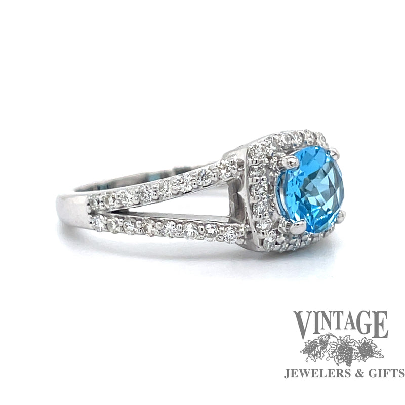 Blue topaz and diamond 14kw gold halo ring