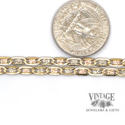 10 karat gold multi color 20.5" diamond cut star design link chain, shown with quarter for size reference