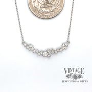 Scattered diamond 14kw gold bar necklace quarter for scale