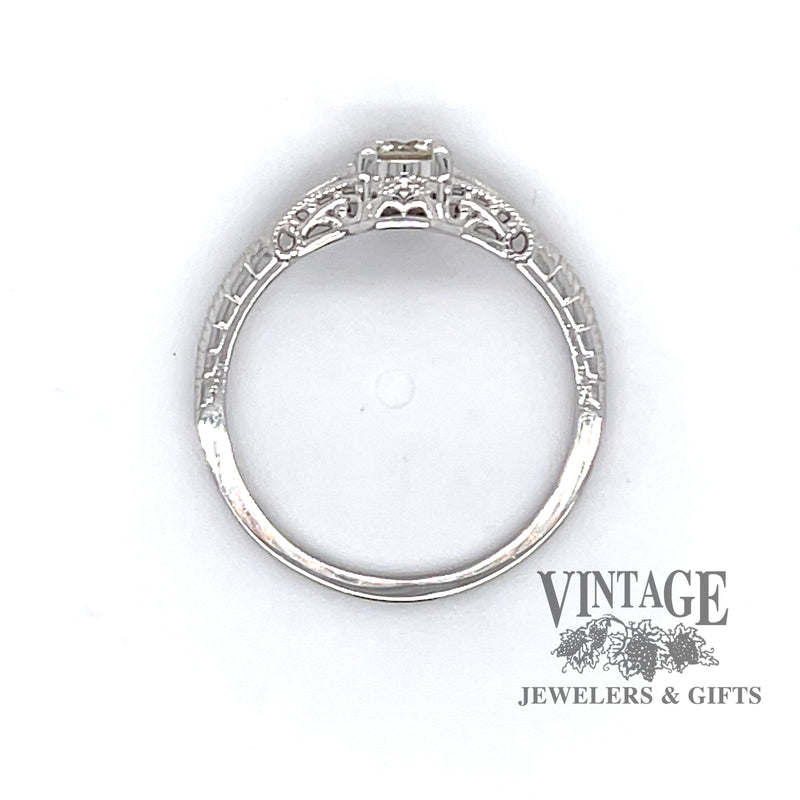 Edwardian inspired solitaire ring design set with a sparkling .36 carat round H color, VS1 clarity, natural diamond in 14 karat white gold, side view through center