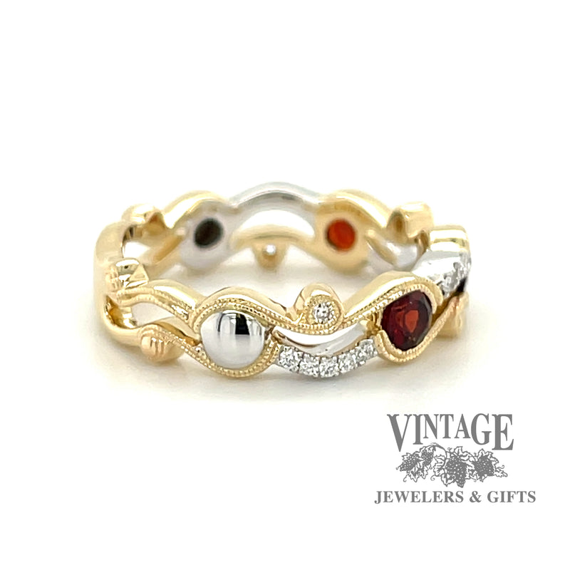 Garnet and diamond 14k two tone gold wave ring