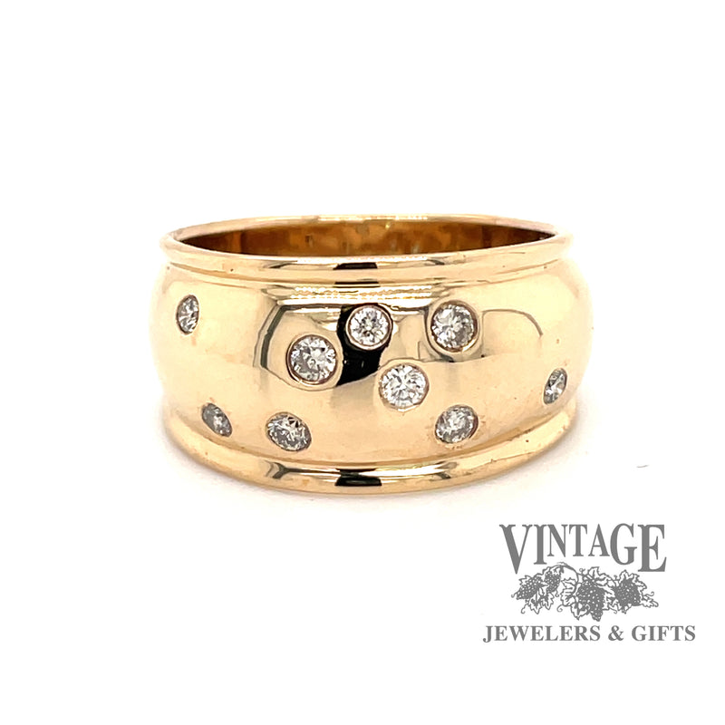 Wide flush set diamond yellow gold band
