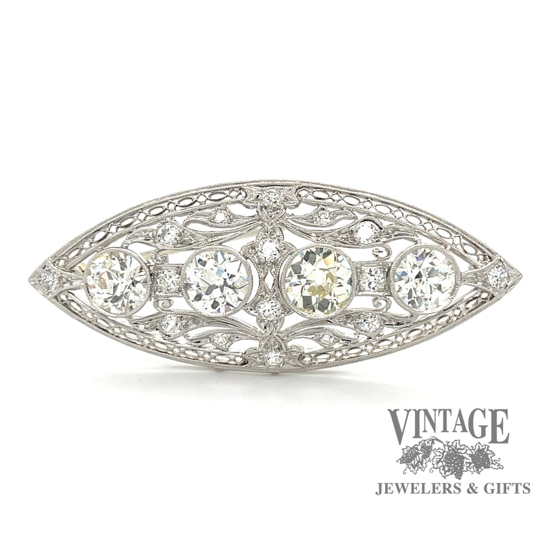 Antique Edwardian platinum and diamond brooch white backround