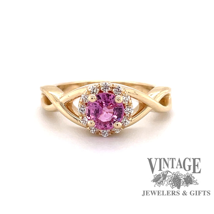 Custom 14 karat yellow gold  pink sapphire with diamond halo ring, front view