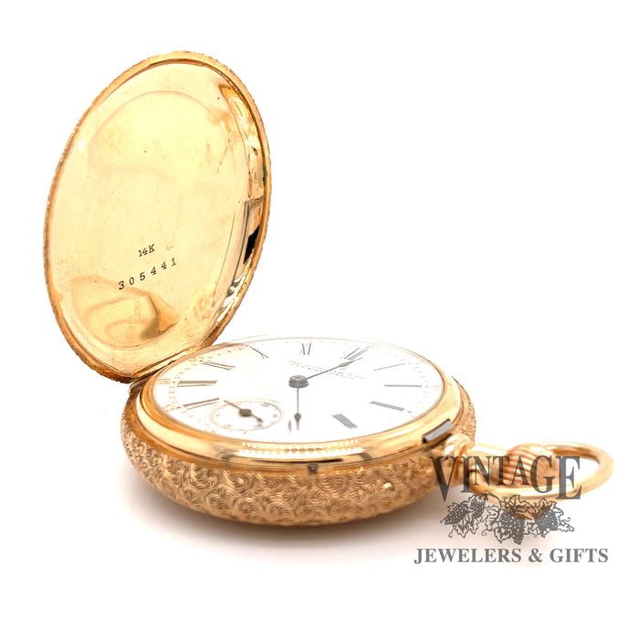 American Waltham Pocket watch in 14k multi color gold case, open side view, showing dial and markings on inside cover.