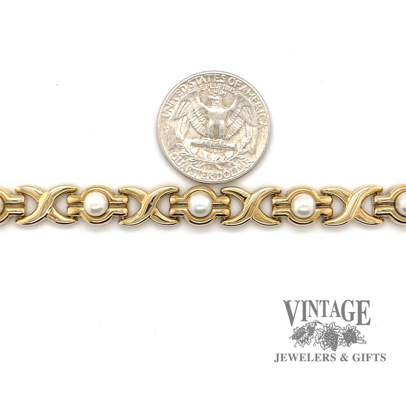 Pearl 14ky gold station link bracelet.