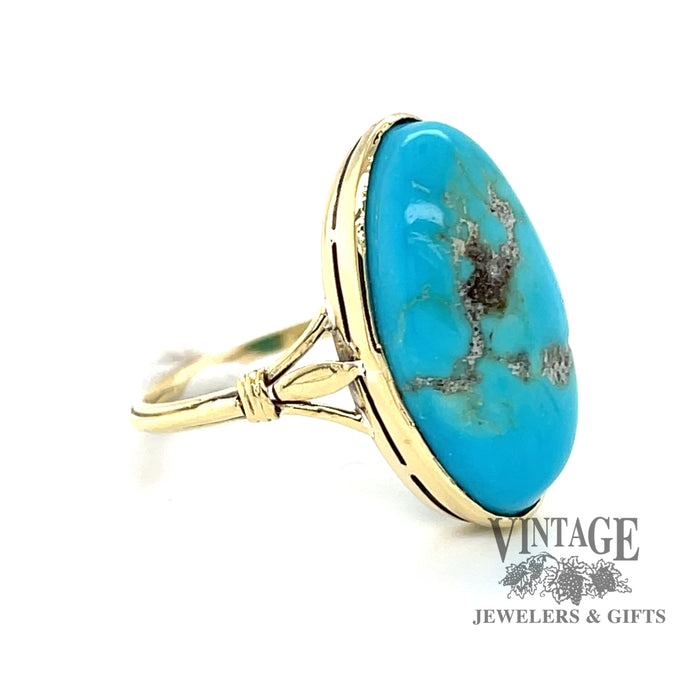 14 karat yellow gold oval turquoise ring with matrix, angled view