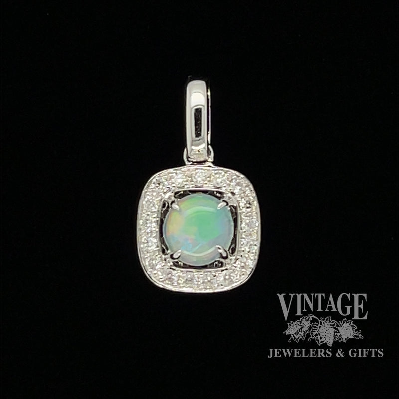 14 karat white gold .33ct Opal and diamond halo pendant