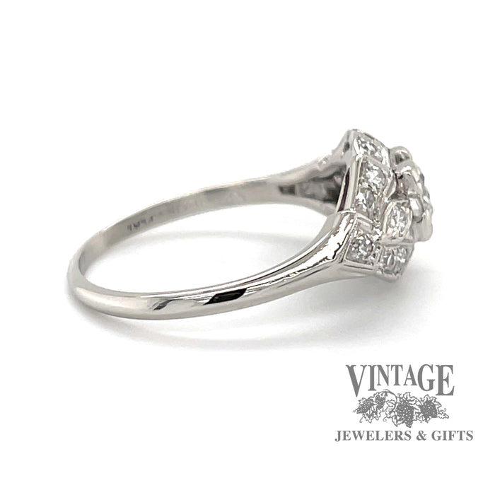 .64 carats total weight vintage platinum Art Deco diamond ring, side view