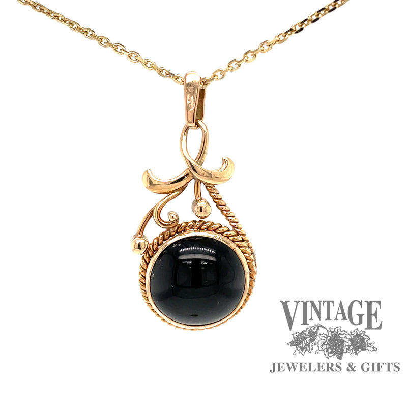 14 karat yellow gold dark green cat's eye tourmaline pendant