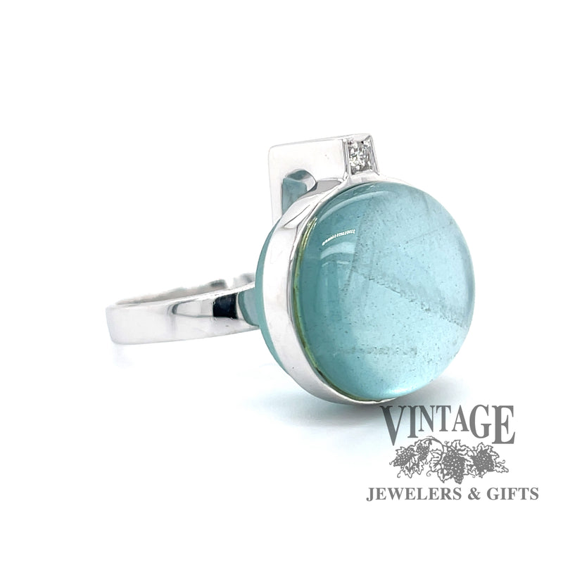 Modern aquamarine and diamond 18kw gold ring