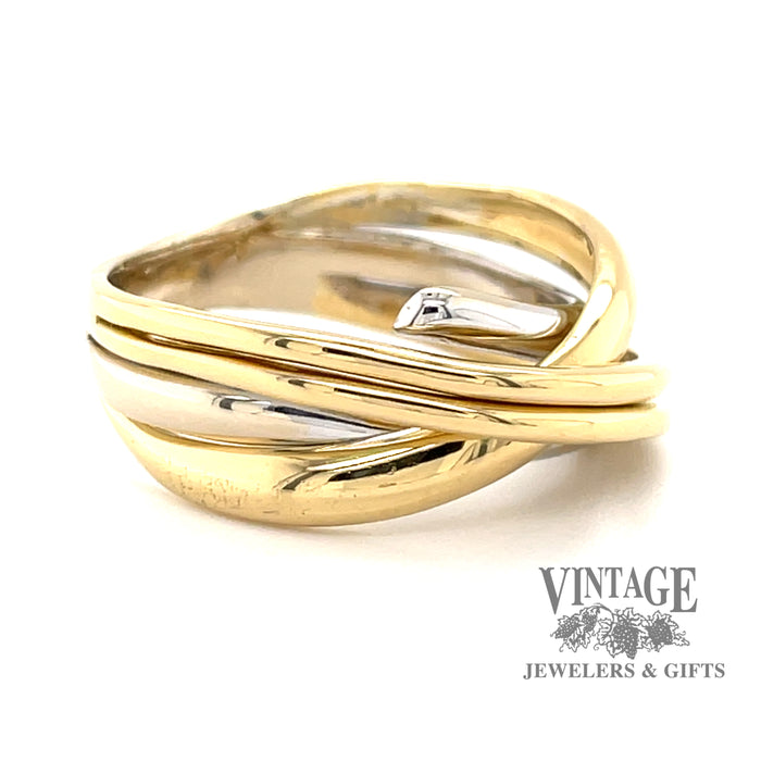 Contemporary 18 karat two tone, yellow and white gold multi-band look ring, angled view