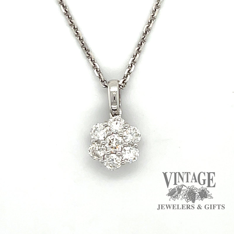 White gold 7 diamond cluster pendant.
