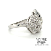 Vintage Art Deco 14 karat white gold diamond pave bow motif ring, angled view