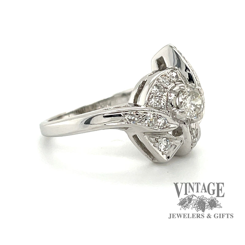 Vintage Art Deco 14 karat white gold diamond pave bow motif ring, angled view