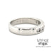 Platinum .42 carat diamond channel set ring, side view