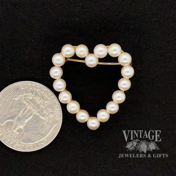 14 karat yellow gold heart shaped pearl pin, shown with quarter for size reference