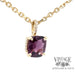 14 karat yellow gold Pink spinel and diamond pendant, angled view