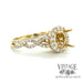 14 karat yellow gold braided shank diamond halo semi-mount ring, angled view