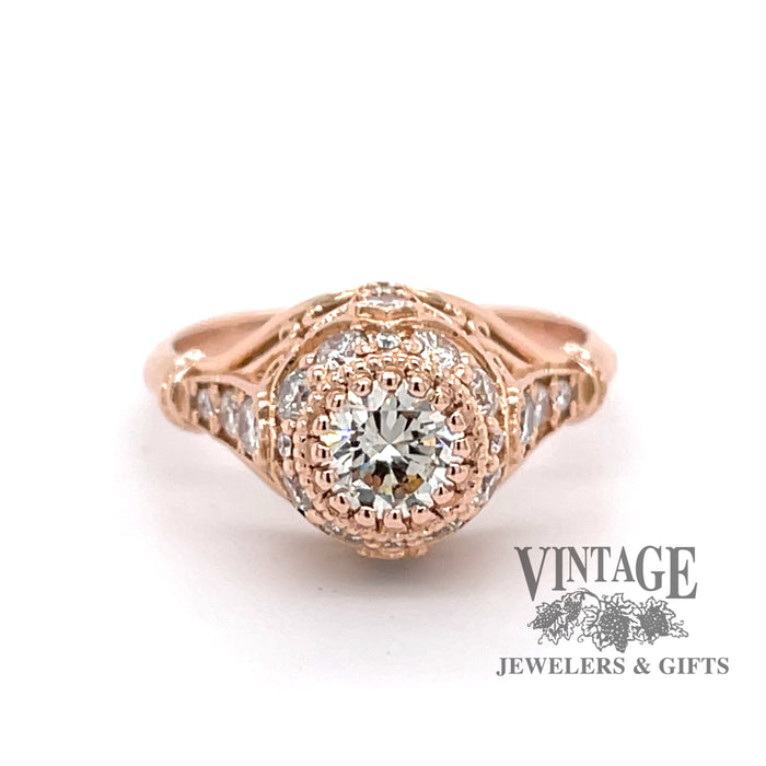 14 karat rose gold diamond engagement ring.