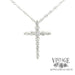 Diamond “bubble” 14ky gold cross necklace