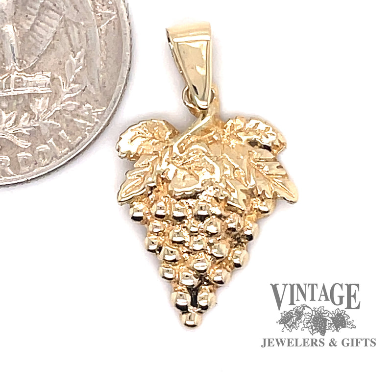 Grape charm in 14ky gold quarter for scale