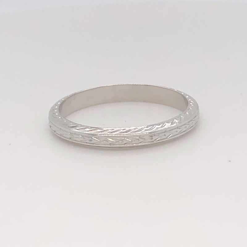 White gold engraved estate wedding band.