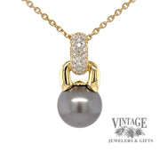18 karat yellow gold Tahitian pearl enhancer pendant with pave' set diamonds, front