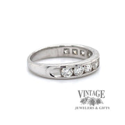 18 karat white gold channel set diamond band, side view