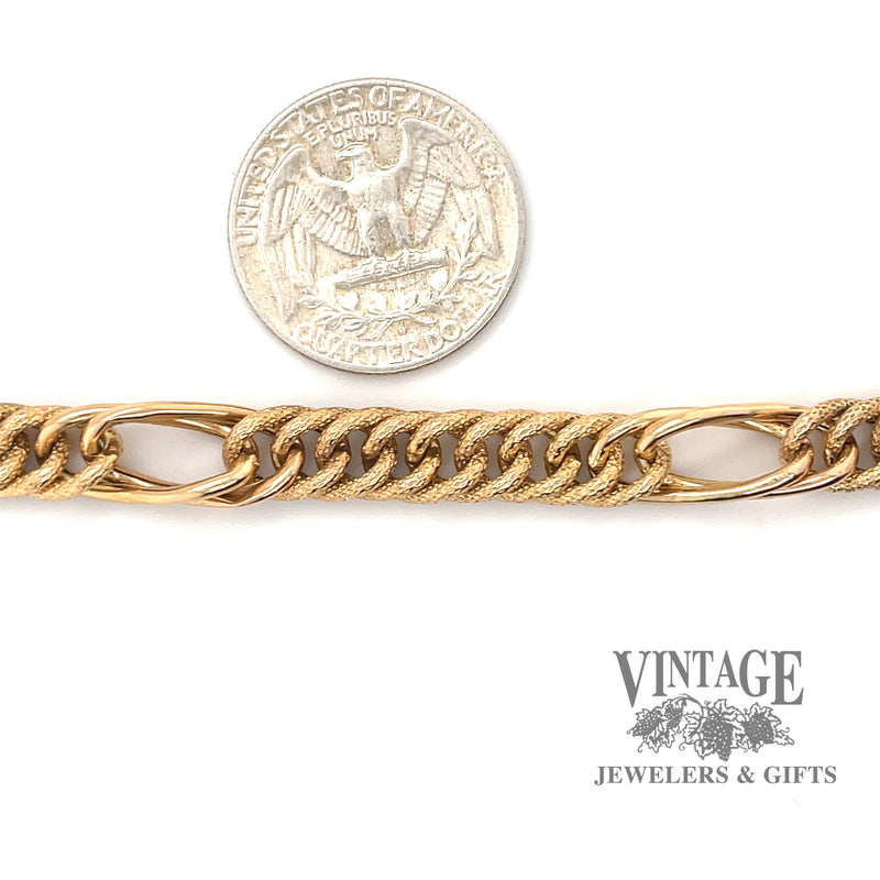 Yellow gold 7.5" link bracelet.
