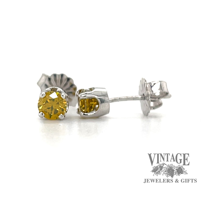  14 karat white gold .52 carat total weight canary diamond stud earrings
