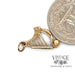 9 karat yellow gold antique Irish harp hand engraved charm, shown with quarter for size reference