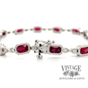 14 karat white gold ruby and diamond link bracelet, clasp close up