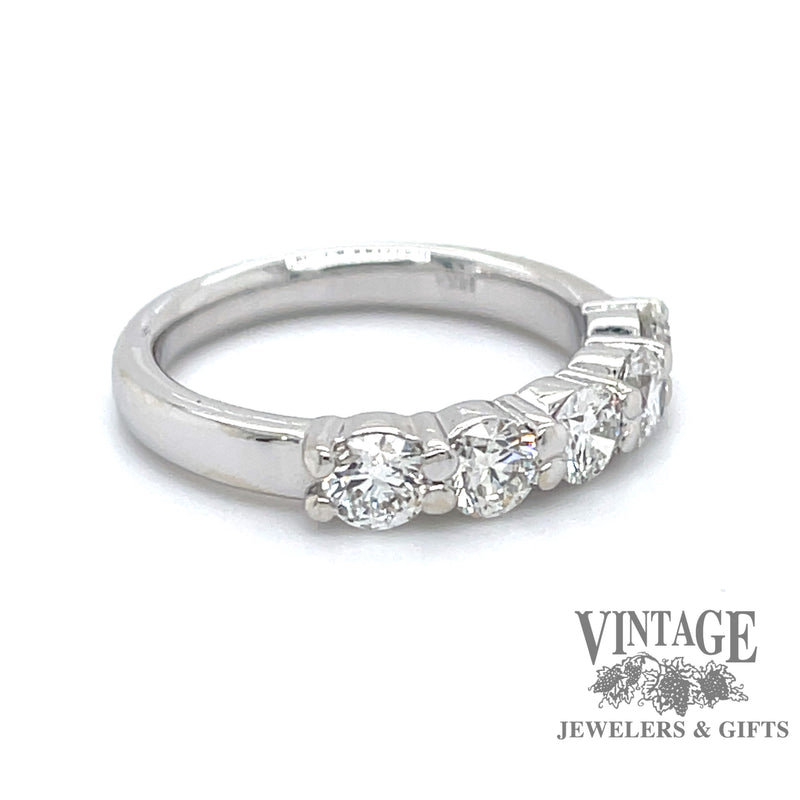 5-diamond 14 karat white gold wedding band, angled view