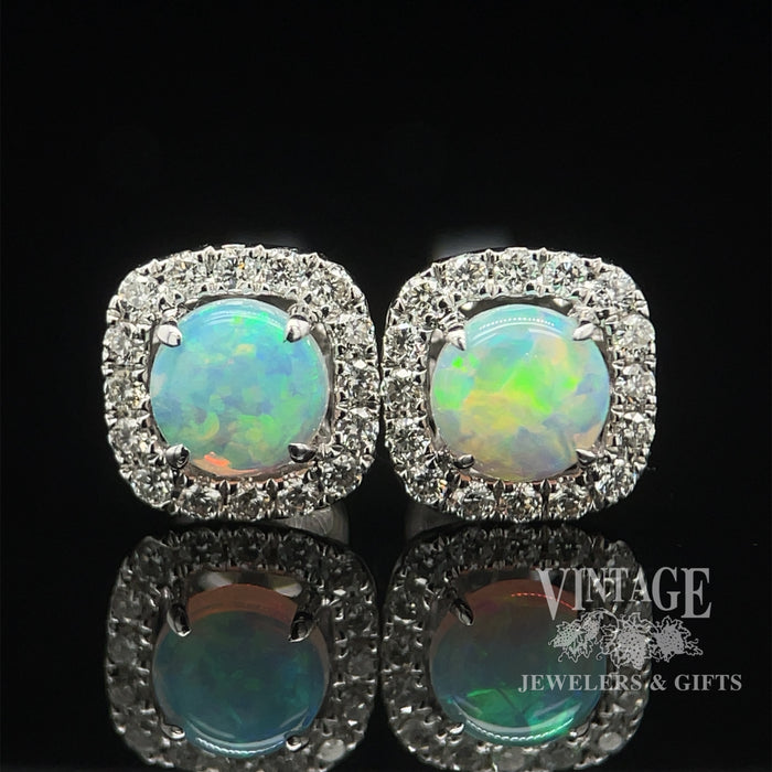 14 karat white gold .66ct Opal and diamond halo earrings