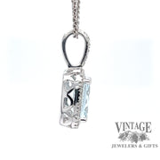 14 karat white gold aquamarine with diamond halo pendant, side view