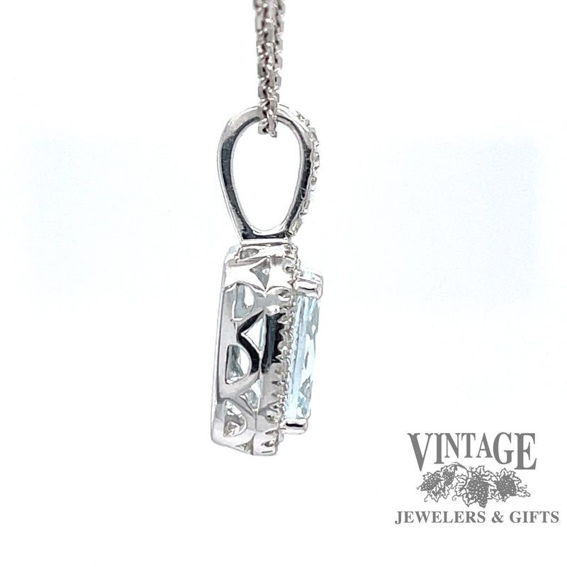 14 karat white gold aquamarine with diamond halo pendant, side view