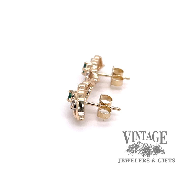 side view of emerald with diamond accent earrings
