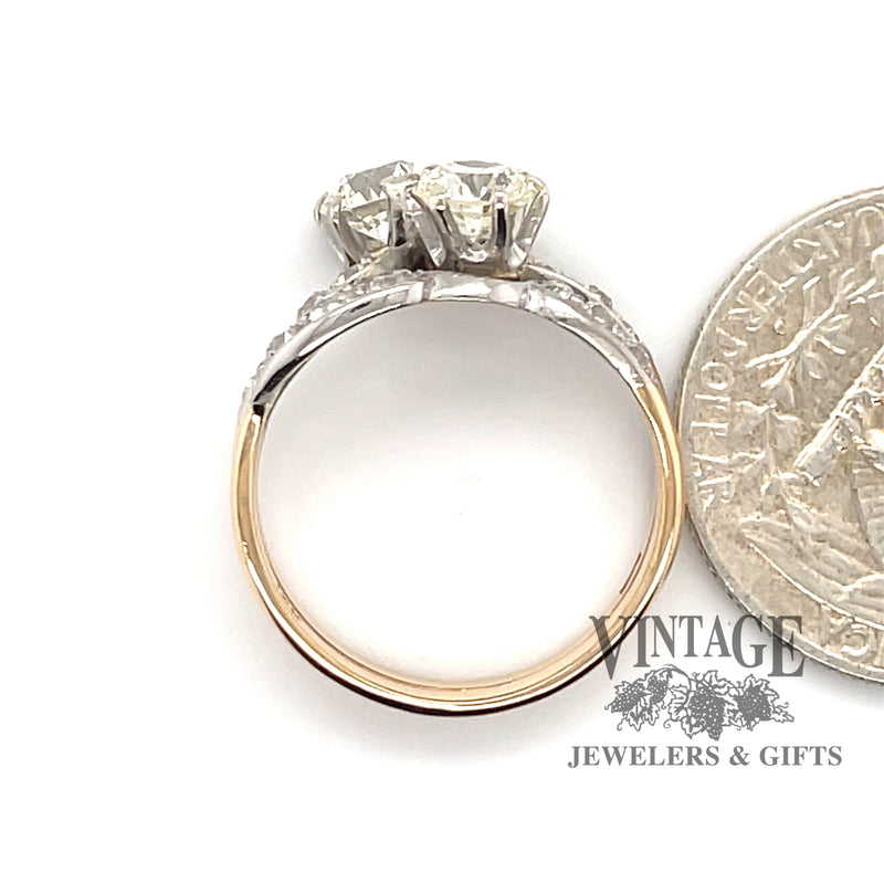 14 karat yellow and white gold 2.38 carat total weight diamond two stone vintage bypass ring, side view next to quarter for size reference