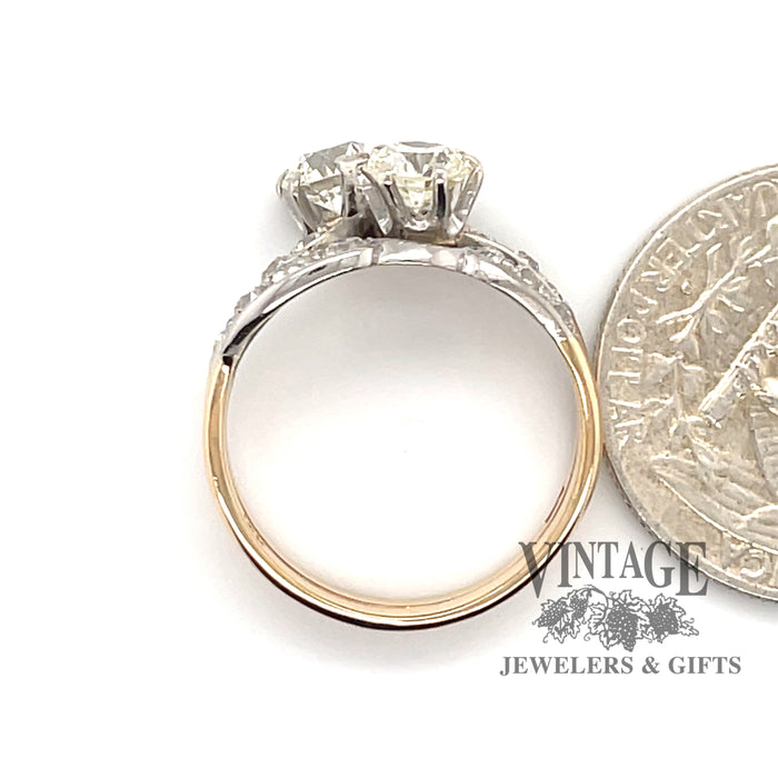 14 karat yellow and white gold 2.38 carat total weight diamond two stone vintage bypass ring, side view next to quarter for size reference