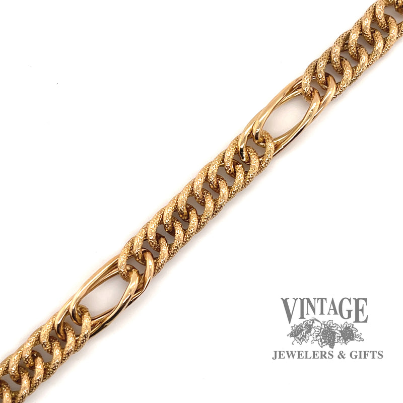 Yellow gold 7.5" link bracelet.