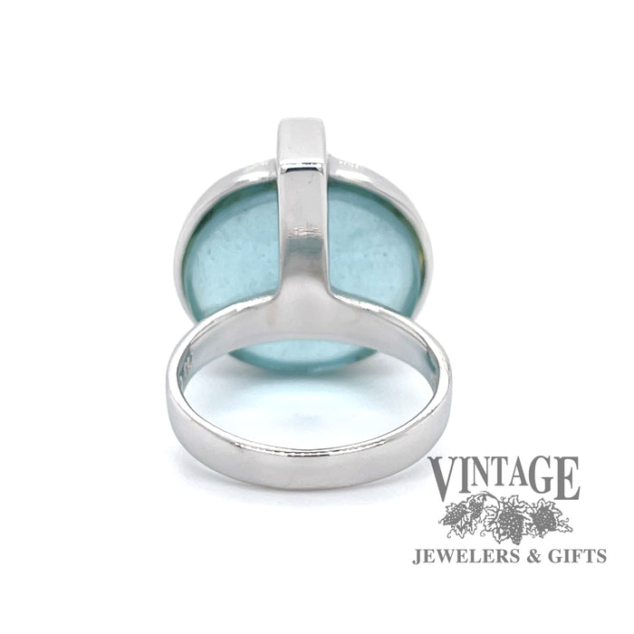 Modern aquamarine and diamond 18kw gold ring