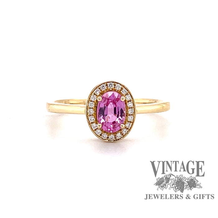 14 karat yellow gold oval pink sapphire and diamond  halo ring, front