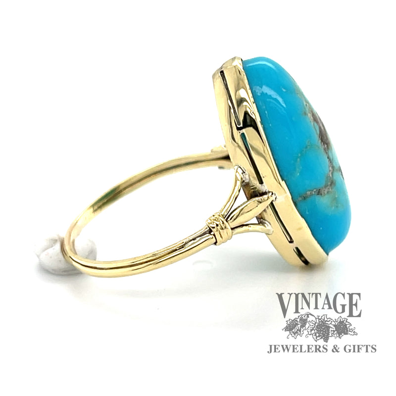 14 karat yellow gold oval turquoise ring with matrix, side view
