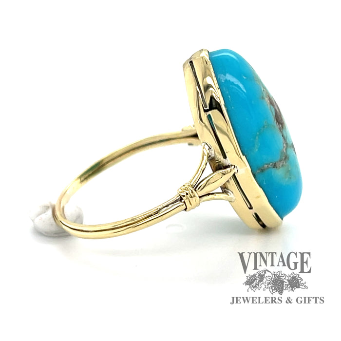14 karat yellow gold oval turquoise ring with matrix, side view