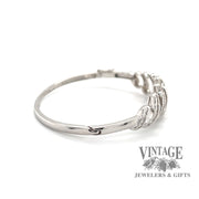 14 karat white gold 3 carat total weight baguette diamond hinged bangle bracelet, side view