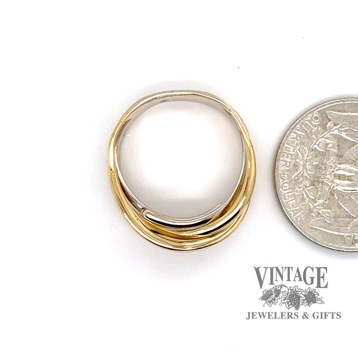 Contemporary 18 karat two tone, yellow and white gold multi-band look ring, shown next to quarter for size reference
