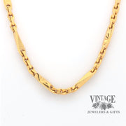 Close up view of 22 karat yellow gold fancy link 16.5" chain.