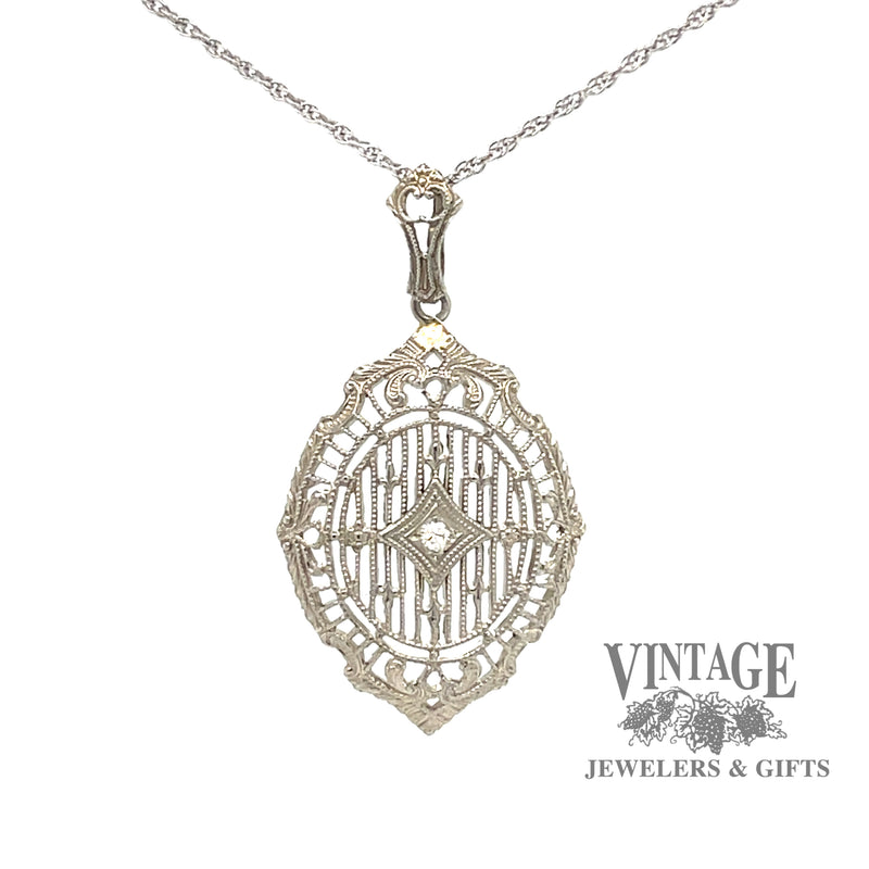 Filigree .02ct diamond pendant in 14kw gold