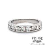 18 karat white gold channel set diamond band